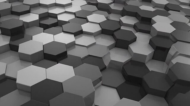 Abstract geometric background with a pattern of hexagonal shapes in various shades of gray