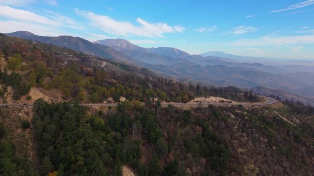 Aerial view of winding mountain highway landscape