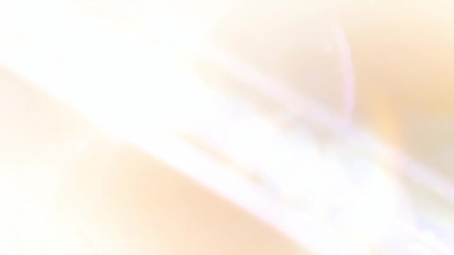 Light Dream Soft Light Abstract Glow of Diagonal Beams and Warm Tones Across a Blurred Surface in Soft Sunrise Palette