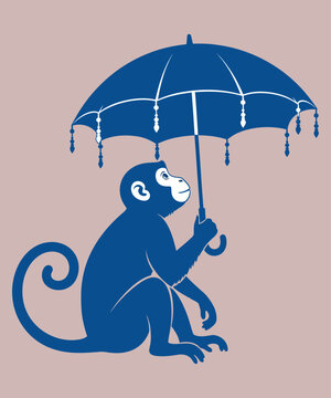 Monkey sitting under an umbrella in the rain