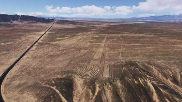 Drone aerial view of Nazca Lines Estudiantes The Spiral. Peru