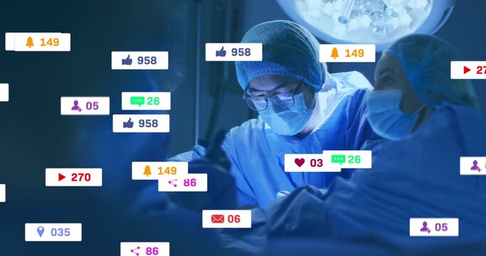 Operating surgical team performing surgery in OR, gowns masks instruments, with notification icons