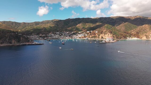 Dolly shot of Avalon on the Catalina island over the water