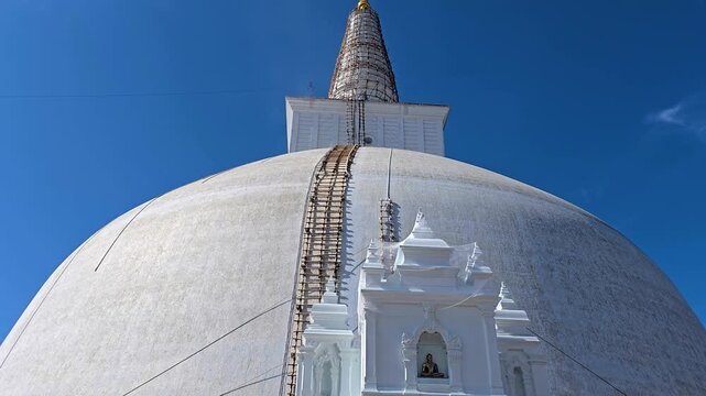 Ruwanweli Maha Seya in Anuradhapura, Sri Lanka, an iconic white stupa built by King Dutugemunu in the 2nd century BCE, showcasing sacred Buddhist architecture and a major pilgrimage site. 