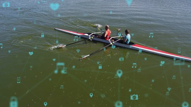 Male bow, female stroke sculling on first drive, propelling shell right, tech phone icon on hull
