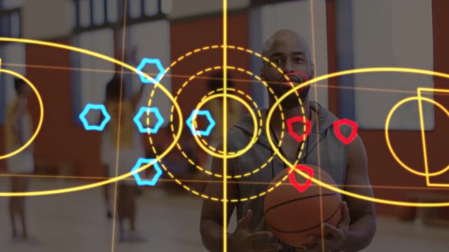 Coach holding ball leading team while graphics overlaying court hexes shields yellow pink for plays