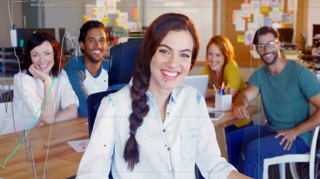 Woman sitting chair leading business meeting, laptop updating and line graphs animating over team