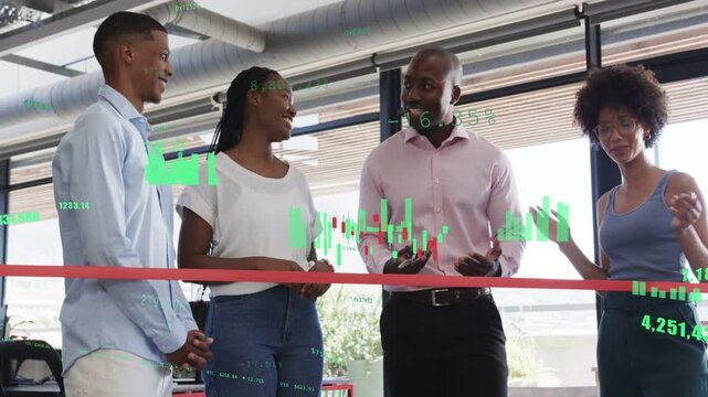 Man cutting ribbon after launch remarks while team clapping with finance charts overlaying frames
