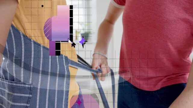 Reaching woman in red T-shirt looping and tightening apron strap at kitchen, preparing for cooking