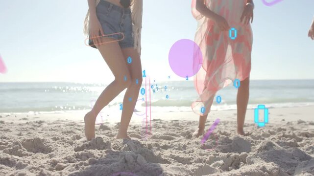 Playing friends passing soccer ball after rolling in on beach, wearing shorts, binary overlays