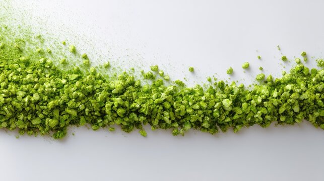Vibrant Green Crushed Rock Salt Spreading Across Smooth White Surface Decorative Element in Culinary Arts and Natural Themes