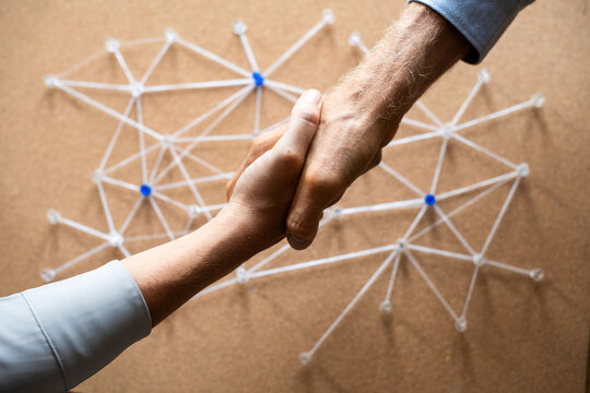 Handshake symbolizes professional network.