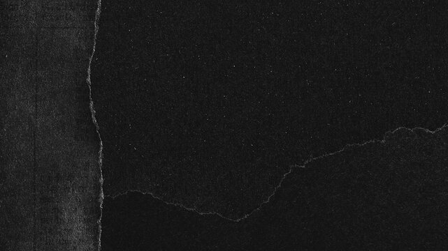Textured torn black paper desktop wallpaper