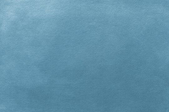 Textured blue leather background with copy space