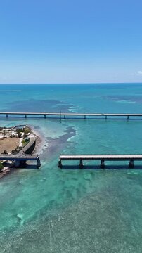 Aerial view of old seven mile bridge and the newer bridge in the background at Pigeon Key in the Florida Keys.