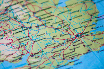 Close-up of a map of England focusing on London and major cities. Detailed cartography of United Kingdom's urban areas for travel planning and tourism concept. © Jimmy