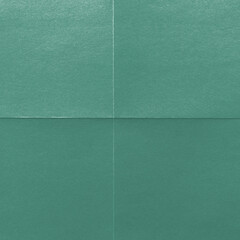 Fototapeta premium Textured teal paper background with copy space