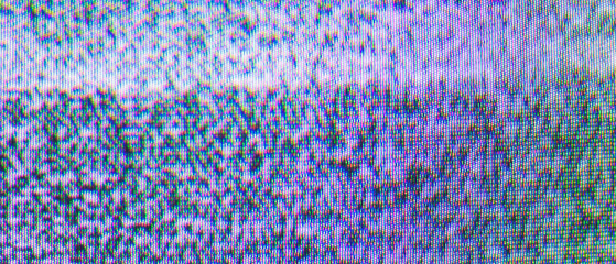 Fototapeta premium Macro shot of heavily distorted crt tv static with vivid purple blue and pink pixel texture