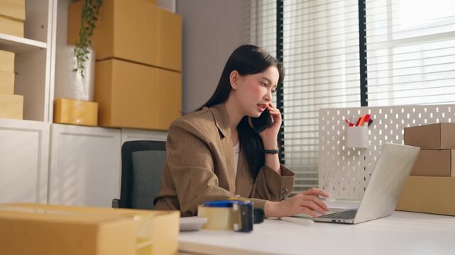 Frustrated woman talking on phone with customer in small home office. 