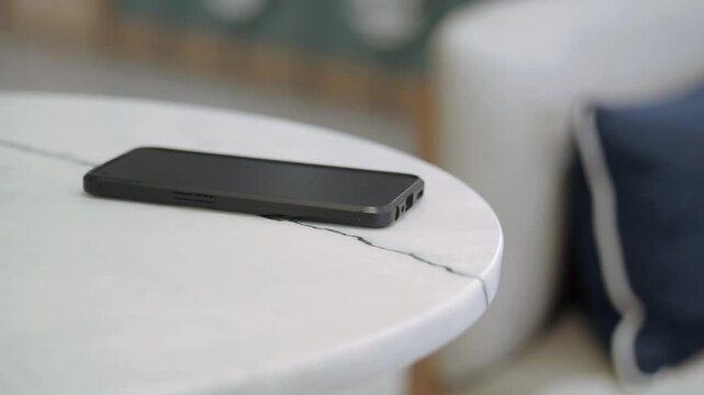 Phone resting on a table. lost smart phone concept 