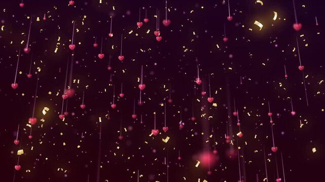 Small red hearts hanging on strings with floating gold confetti against a dark purple festive romantic background