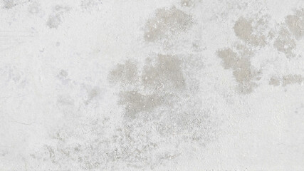 Fototapeta premium Rough concrete texture desktop wallpaper in light gray with subtle weathered patches
