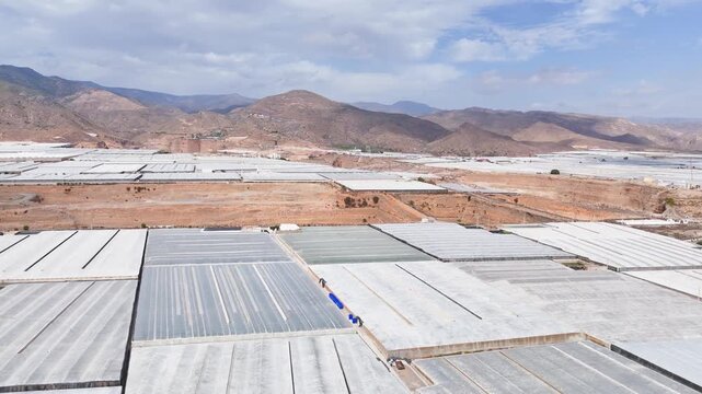 mining terra forming greenhouse agriculture plastic sea industry field pattern mountain nature skyline horizon invernaderos mine dig extraction intensive farming texture - Andalusia, Spain - 2025