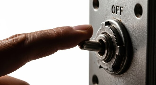 Close Up Hand Turning Metal Switch on Off Dial