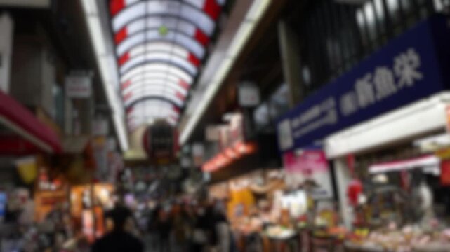 Crowded Kuromon Ichiba Market with Shoppers and Food Stalls in Osaka