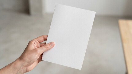 Obraz premium Minimal Paper Flyer Mockup In Hand Closeup