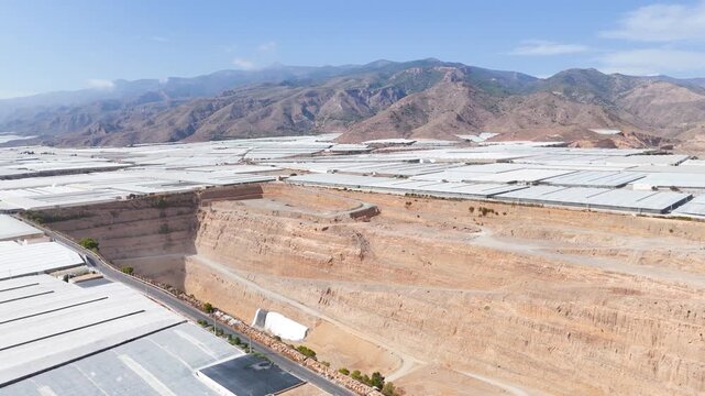 mine drone industry mining dig plastic sea ecology protection environment danger warning greenhouse mountain travel skyline summer business success - Andalusia, Spain - 2025