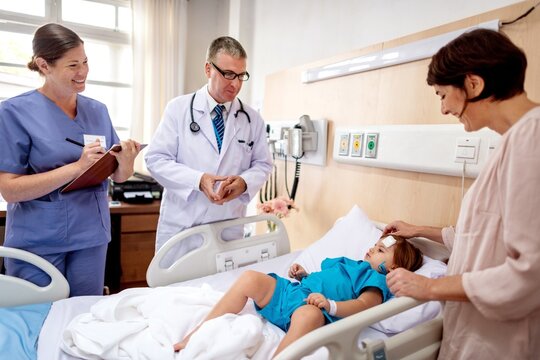 Healthcare professionals caring child patient.