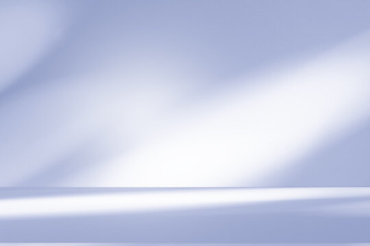 Wall interior background, studio and backdrops show products.with shadow from window color white and blue background for text insertion and presentation product	