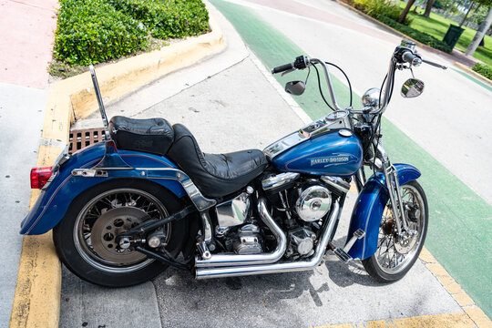 Miami, Florida, USA - July 27, 2025: Blue motorcycle, side view. Harley Davidson FXSTS Softail Springer motorcycle 1991 cruiser. Luxury motorcycle Harley Davidson FXSTS Softail Springer outdoor