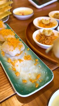 Chopsticks Picking Up Vietnamese Banh Beo Hue Steamed Rice Cakes