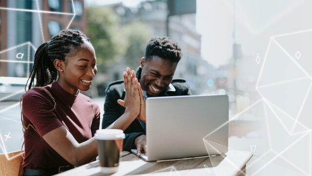 Students giving each other a high five