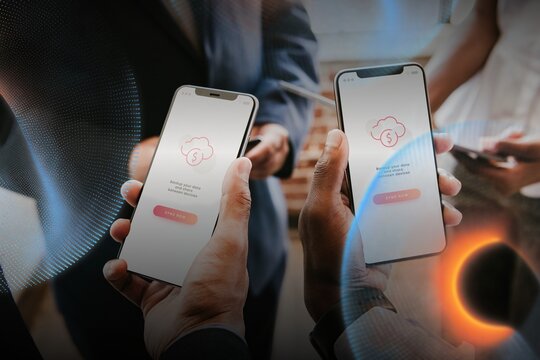 Businessmen syncing data from their phones