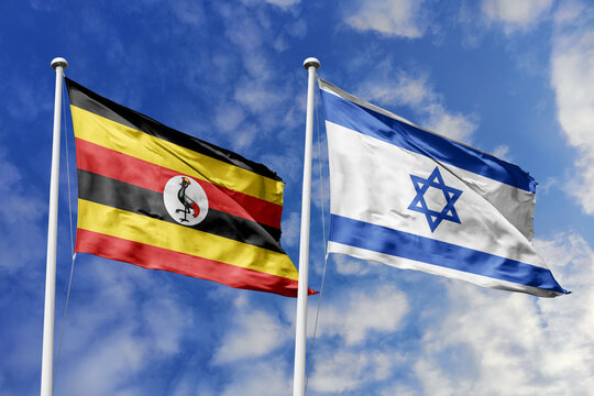 Uganda and Israel flags waving in a clear blue sky symbolizing a powerful diplomacy a strategic partnership, and a shared vision of unity for a sustainable future.
