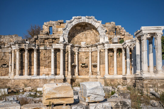 Ruined antique Anitsal Cesme (Nymphaeum) in Side. Antalya, Turkey.