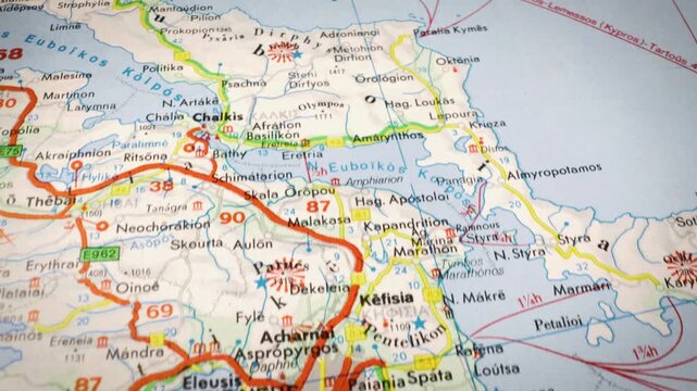 Smooth sliding shot across road map traveling over Greece to Athens
