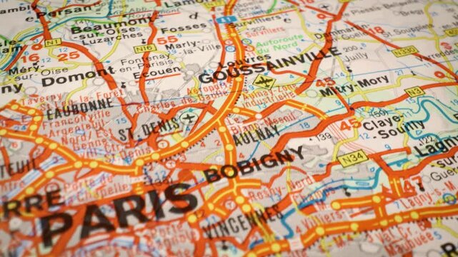 Sliding camera movement across road map towards Paris, France, urban navigation concept