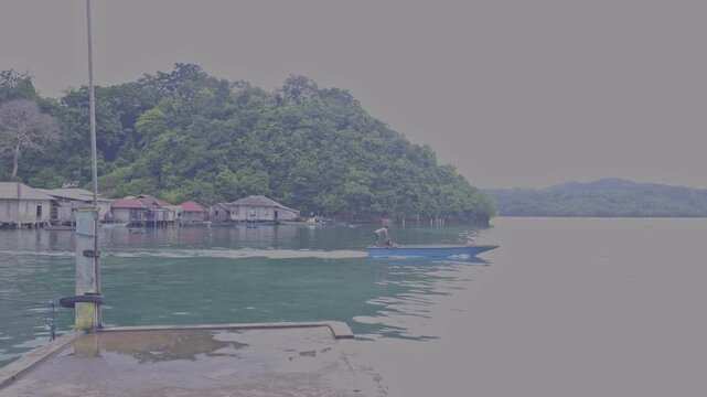 People Boarding Small Speedboat at Ngafan Pier