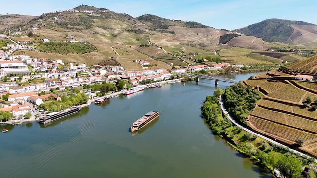 Douro river valley cruise ship navigating near pinhao portugal