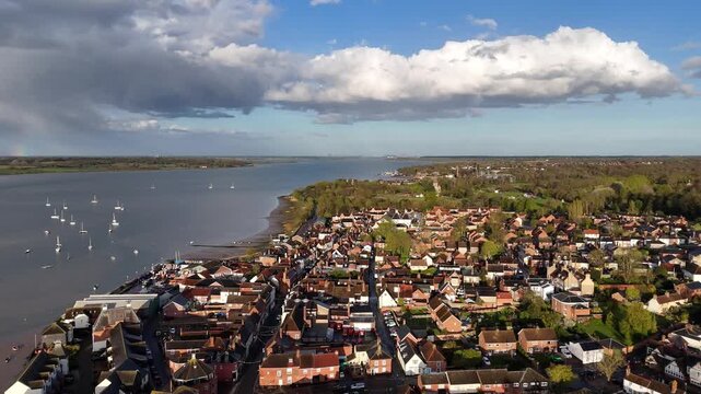 Aerial of Manningtree, Essex, a town on the River Stour, with houses and boats