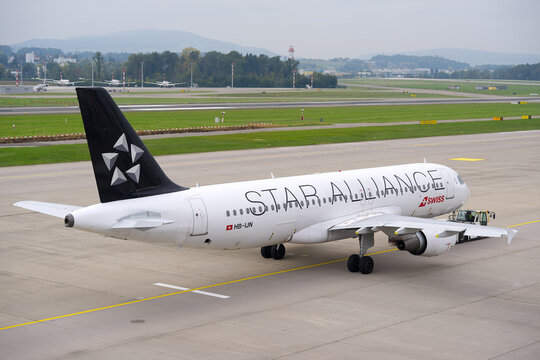 Pushback of Swiss passenger airplane Airbus A320-214 registration HB-IJN at Swiss Airport on an autumn day. Photo taken October 3rd, 2025, Zurich Airport, Switzerland.