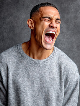 Man expressing intense anger and frustration with a loud shout