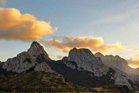 Mountain Landscape with Golden Light and Blue Sky