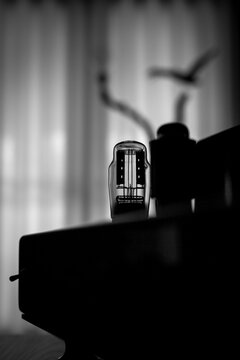 Vacuum tube silhouette in a handmade High-End Tube Amplifier. Black and white picture
