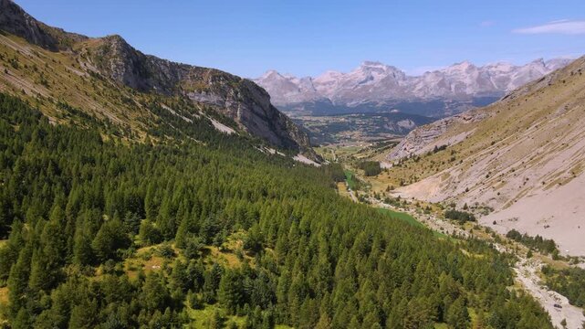 Aerial view of Col du Noyer looking towards the mountains of the Devoluy Massif in Summer. Valley in Hautes-Alpes (Alps), France