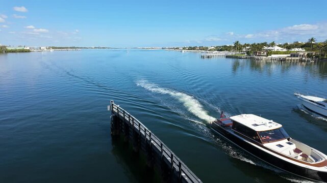 View from Boynton Beach Florida drawbridge of two boats on ICW getting ready to pass under bridge.
